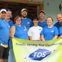 Raul (left) volunteering with Habitat For Humanity 