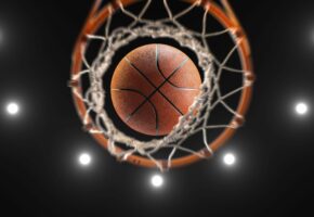 3d,Rendering,Basketball,On,Hoop,And,Lighting,From,Roof,Stadium